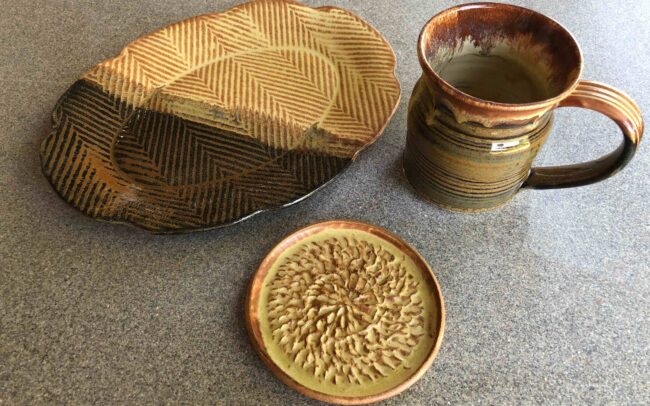 Pottery platter, mug and garlic grater